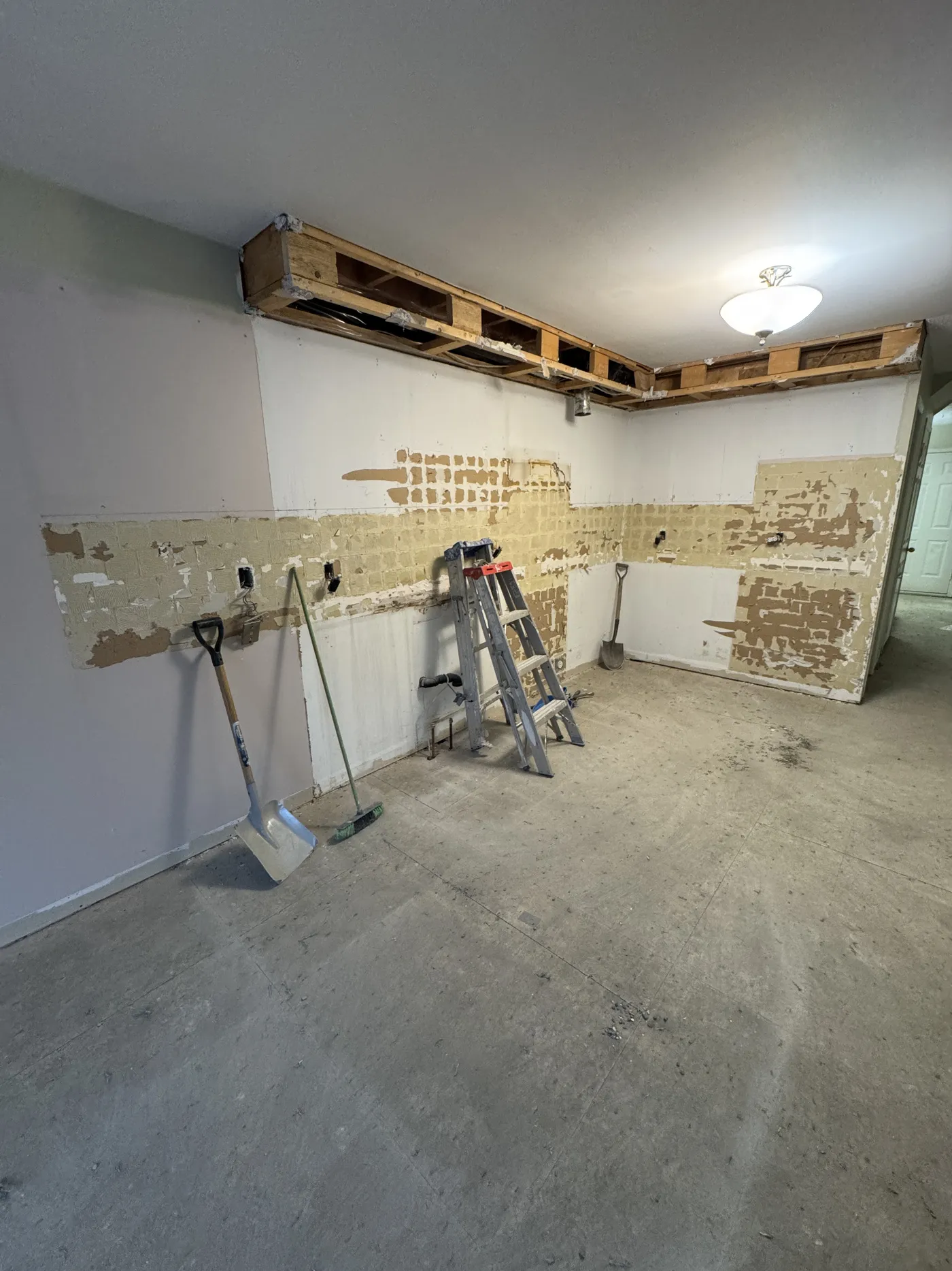 The kitchen stripped back to the walls.